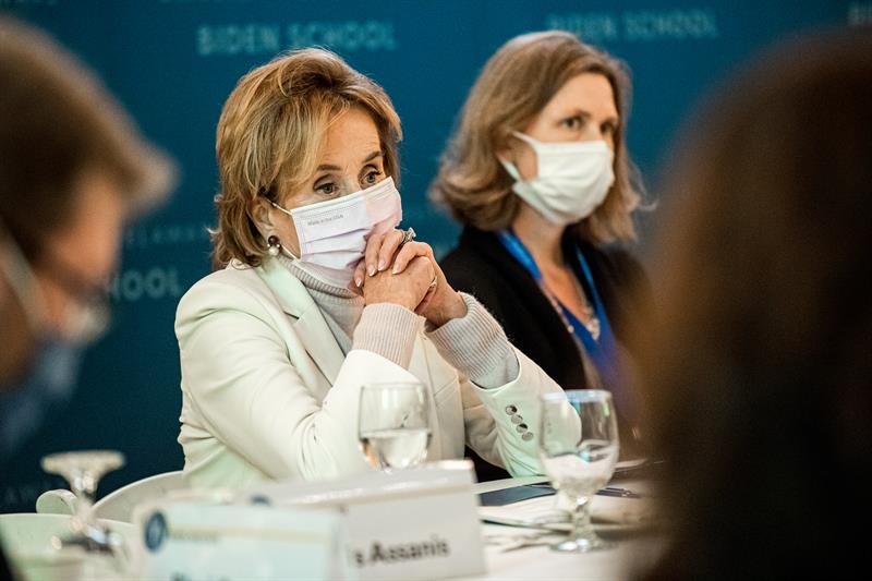Valerie Biden Owens and Leah Seppanen Anderson sitting at a table wearing masks.