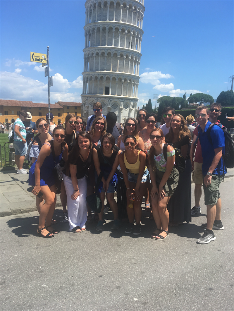 Leadership students pose in front of the leaning tower of Pisa.
