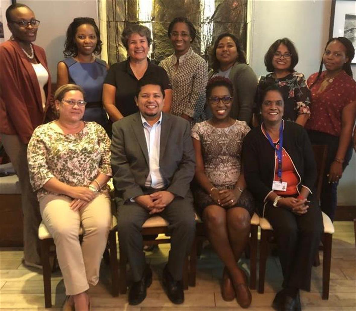 Dr. Kalim Shah with a group of stakeholders in Guyana