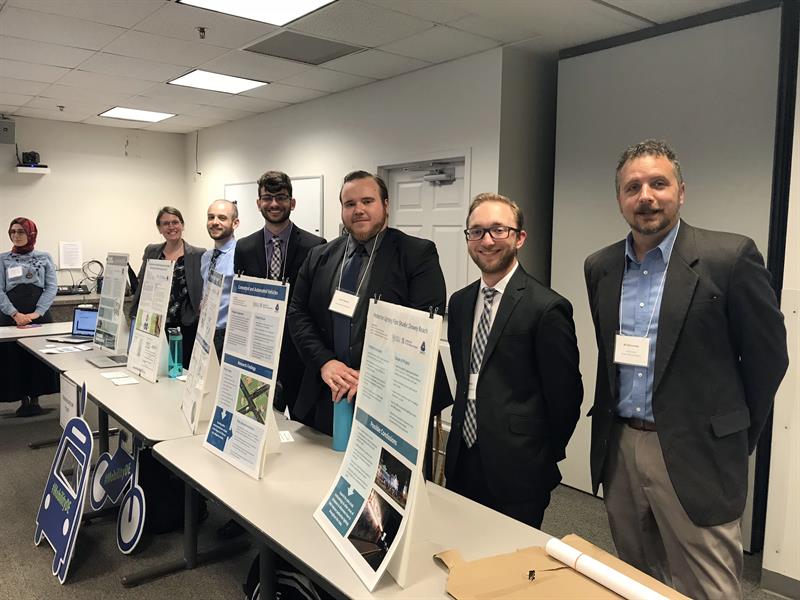 Five students and their IPA staff supervisor share the specifics of each of their research projects through graphics and posters at the 2018 DelDOT Research Showcase