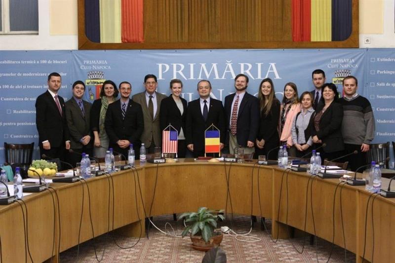 A group of policy students at a government building in Romania.
