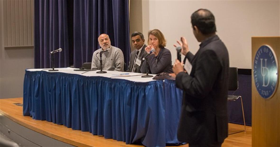 UD's Saleem Ali, Blue & Gold Professor of Energy and the Environment, asks a question of a panel during the two-day Smart Cities & Sustainable Energy Symposium. From left to right, they are: Ismat Shah, UD professor of materials science and engineering; UD alum Chandrasekar Govindarajalu of the International Finance Corporation; and Andrea Sarzynski, UD associate professor in the School of Public Policy and Administration.