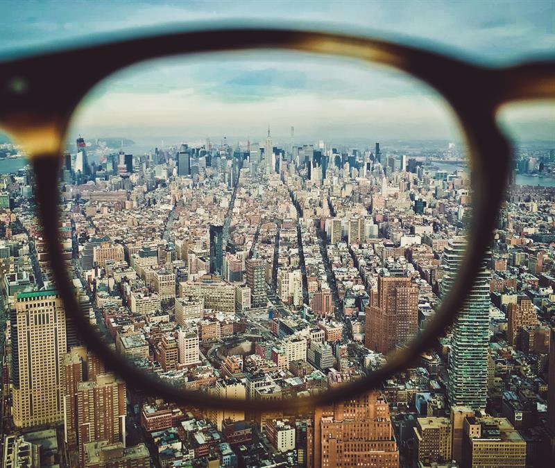 cityscape viewed through eyeglasses