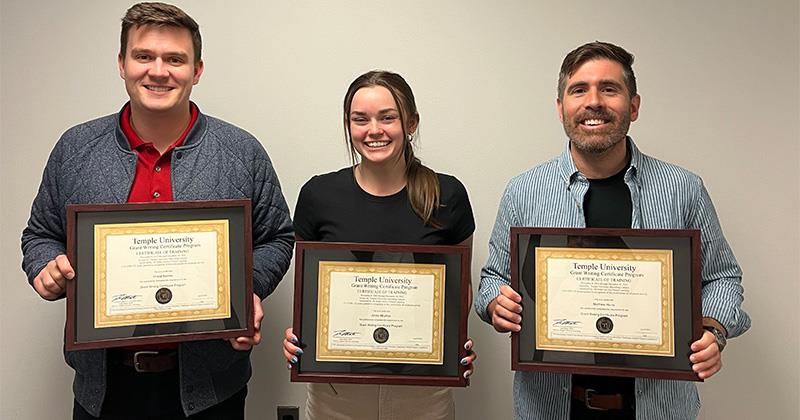 Photo of (from left to right) Chase E. Barnes, Jenna Mayhew, and Matt Harris holding their individually awarded Grant Writing Certificates from Temple University