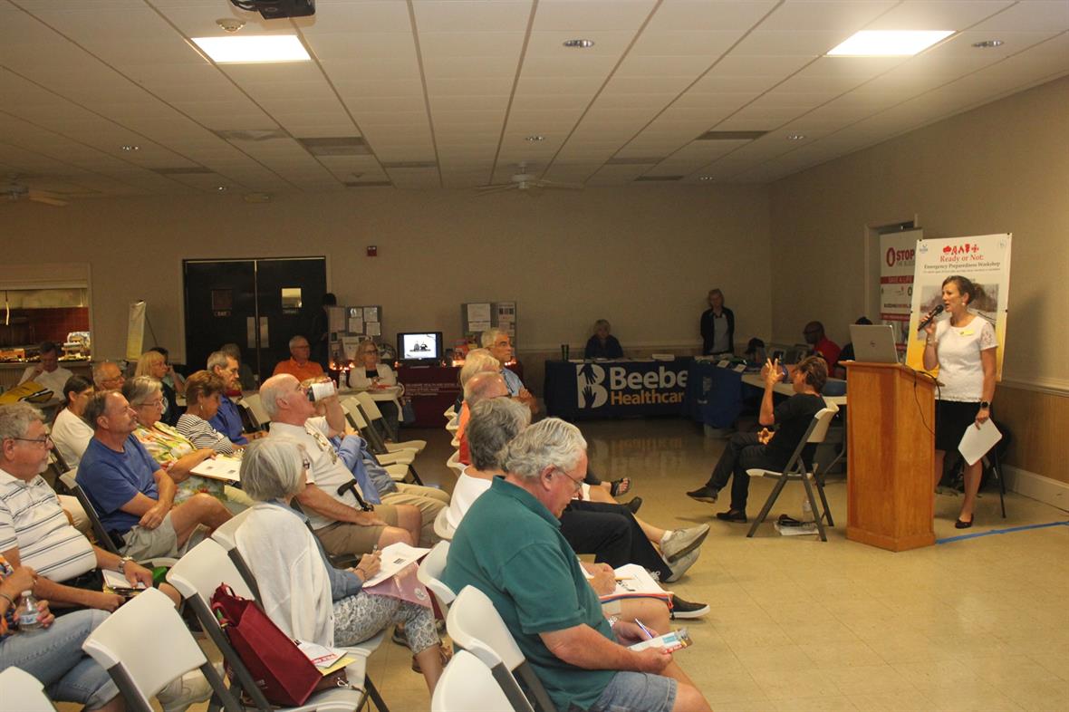 Julia O'Hanlon speaks to a large crowed about aging in place at the Roxanna Firehall in Sussex.. 