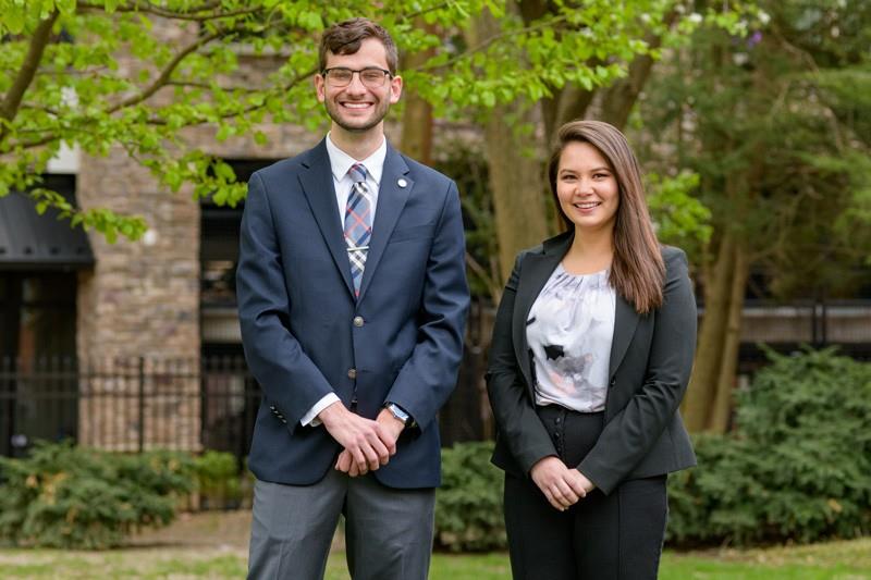 UD students Nicholas J. Konzelman (left) and Bailey A. Weatherbee, who will graduate on Saturday, were honored for their great achievements by the UD Alumni Association, which also recognized several alumni for their contributions. (Photo courtesy Evan Krape/UDaily)