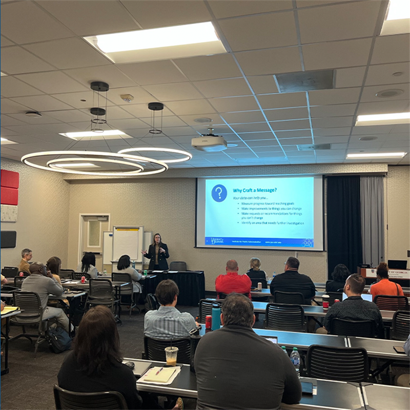 Photo of Sarah Marshall leading a presentation titled, "How to Craft Your Message for Different Audiences," at the second annual Developing Data Analytics Capabilities Conference at the University of Georgia