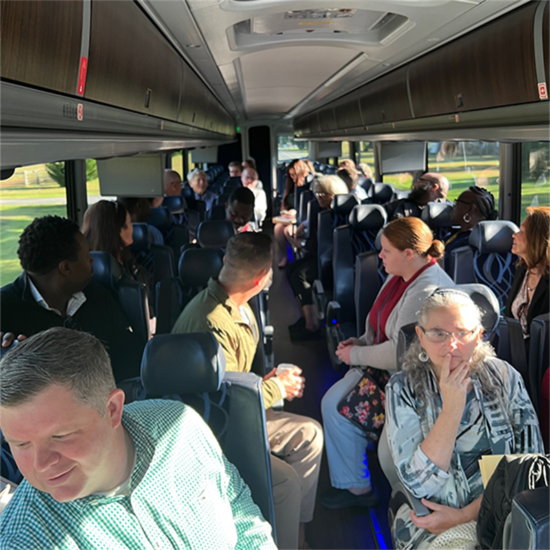 Image featuring Sean O'Neill and participants of the Sussex County Housing Bus Tour, 2023