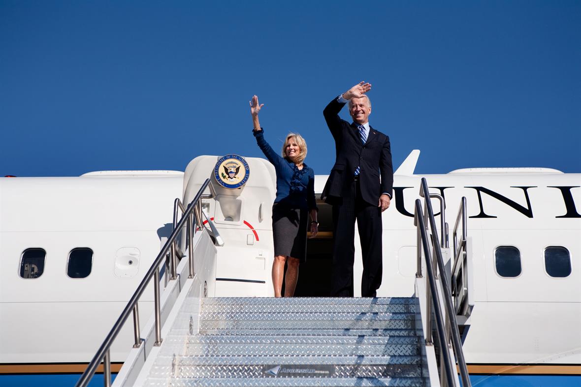 Joe Biden and Jill Biden wave Air Force 2