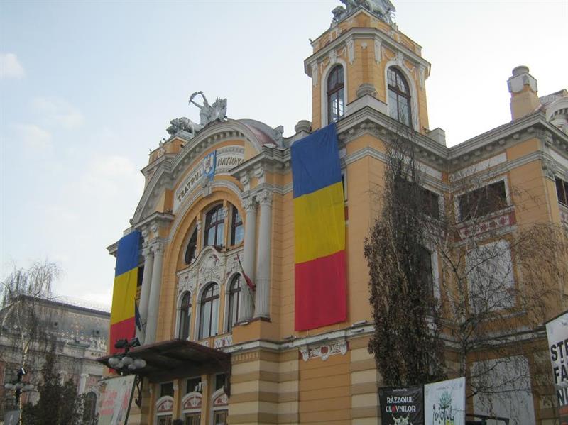 A building with bright banners in Cluj-Napoca, Romania.